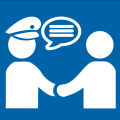 Symbolbild Polizist und Bürger sprechen miteinander